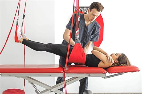 Dieťa cvičiace na zariadení Redcord System®