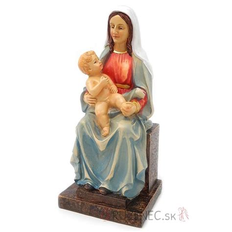 Žena s vyčerpaným výrazom sediaca s dieťaťom