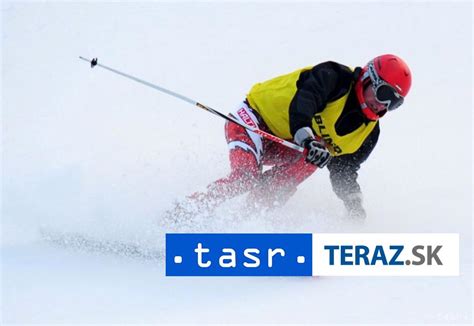 Zrakovo postihnutý lyžiar s navádzačom