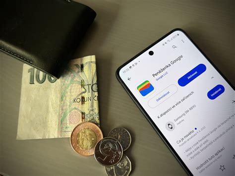 Smartfón s aplikáciou Peňaženka Google a NFC ikonou
