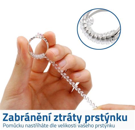 Rôzne pomôcky na zmenšenie prsteňa, ako sú silikónové prúžky a pružinové vložky.